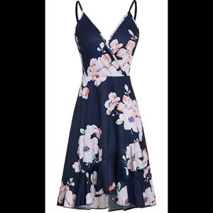 *Brand New With Tags* Never worn before. Floral Dress.